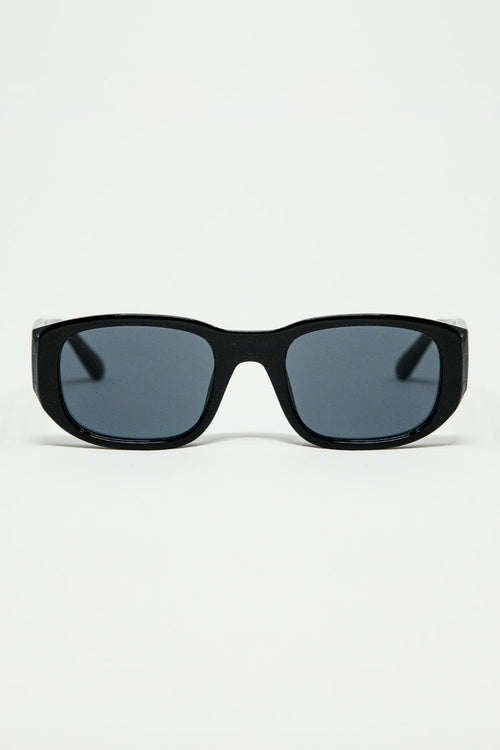 Oval Sunglasses with High Gloss Transparent Frames in black