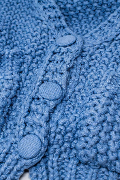 Oversized light blue chunky knit jacket with pockets