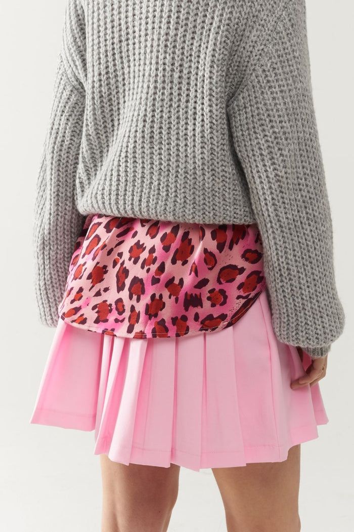 pink pleated mini skirt