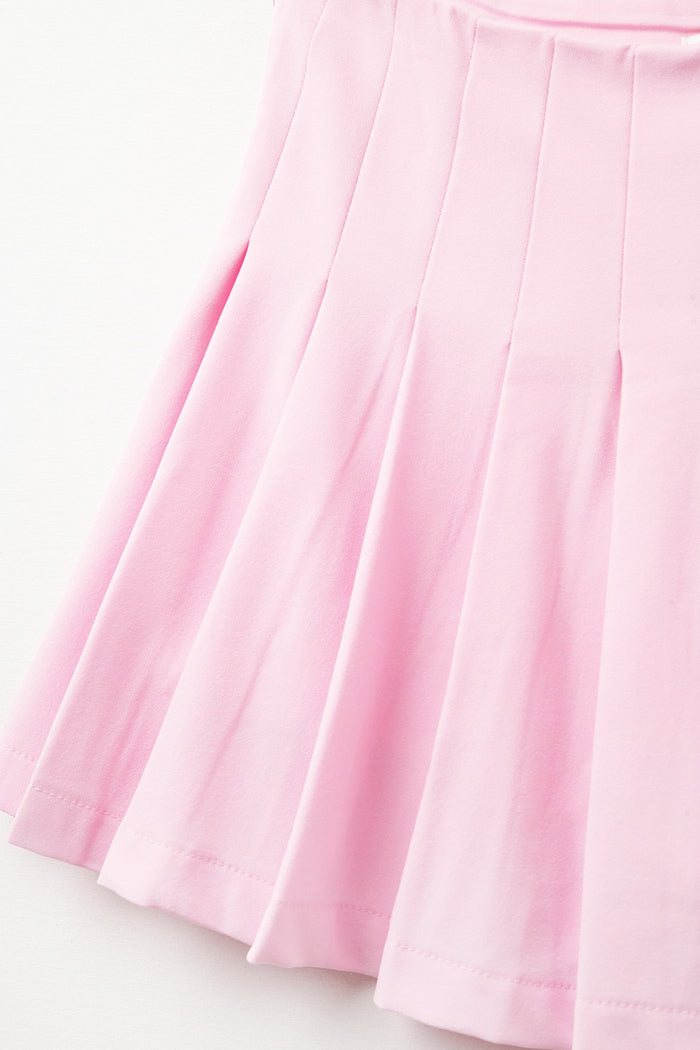 pink pleated mini skirt