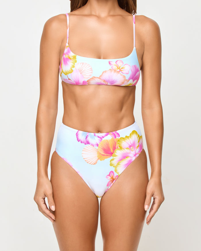 LSPACE Presley bikini top in Hibiscus And Plumeria Oh My print, close-up detail view on model.