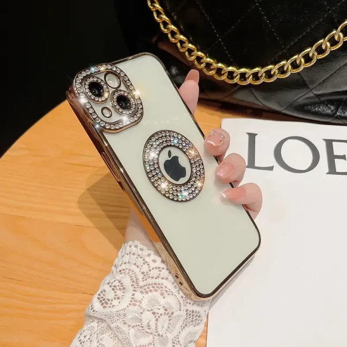 a woman holding a phone case with a chain around it