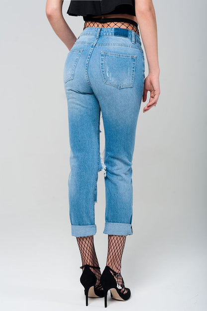 Ripped mom jeans with fishnet tights - Denim
