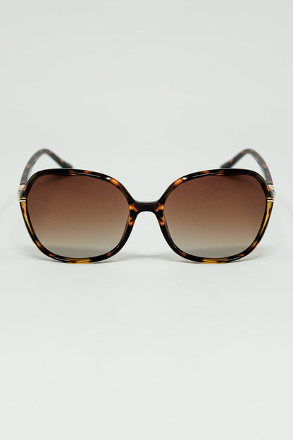 Round beige printed sunglasses with gold metal detail