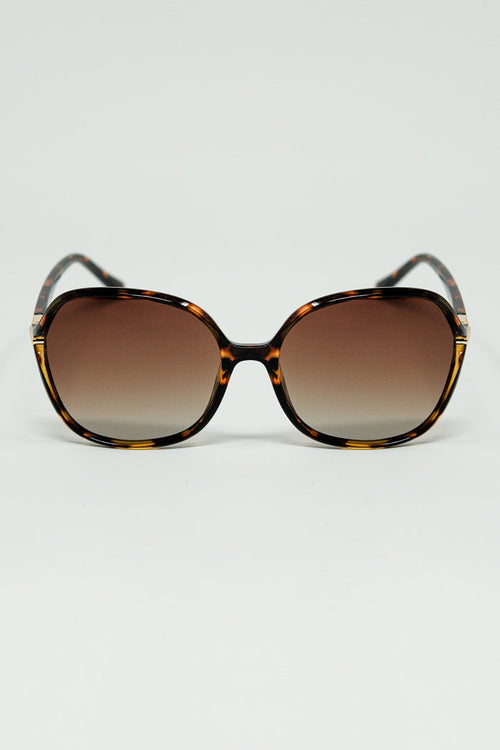 Round beige printed sunglasses with gold metal detail