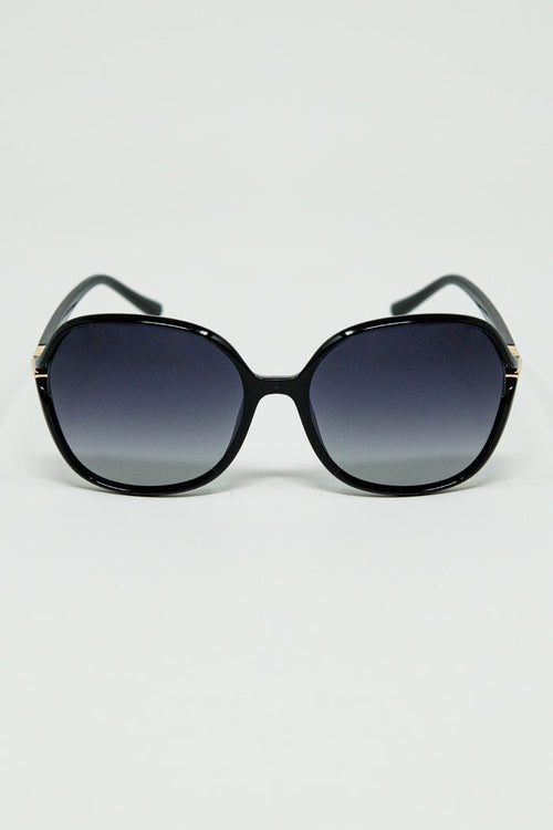 Round sunglasses in black with gold metal detail