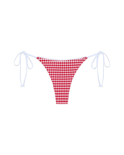Off-model front view of the LSPACE lipstick red Samba Bikini Bottom in a red and white gingham print with white string ties, paired with the matching Samba Bikini Top.