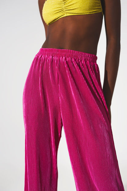 Satin pleated wide leg pants in fuchsia - trousers