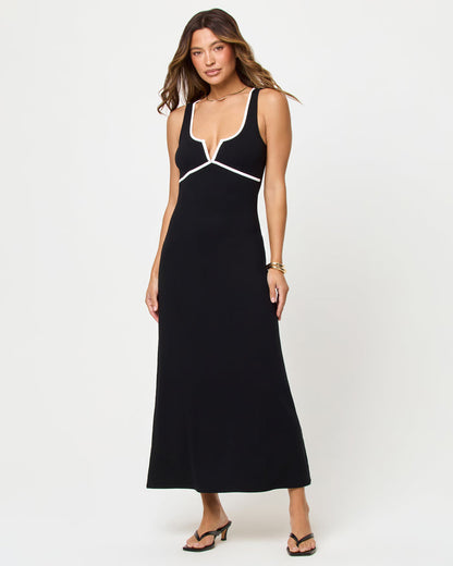 Front view of model wearing the LSPACE Sayge Maxi in black-cream, a sleeveless tank-strap maxi dress in black with cream contrast trim at the sweetheart neckline.