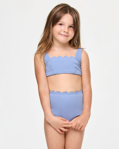 LSPACE Seashell Swirl set in chambray, front view on model.