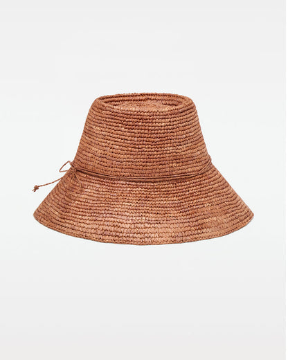 Off-model front view of the brown Seville Hat, a woven straw bucket hat with cord tie.