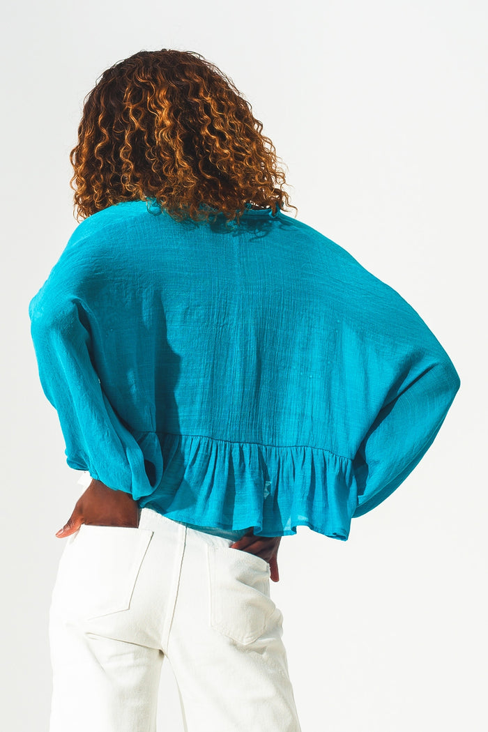 Shirred crop top with embroidery in blue