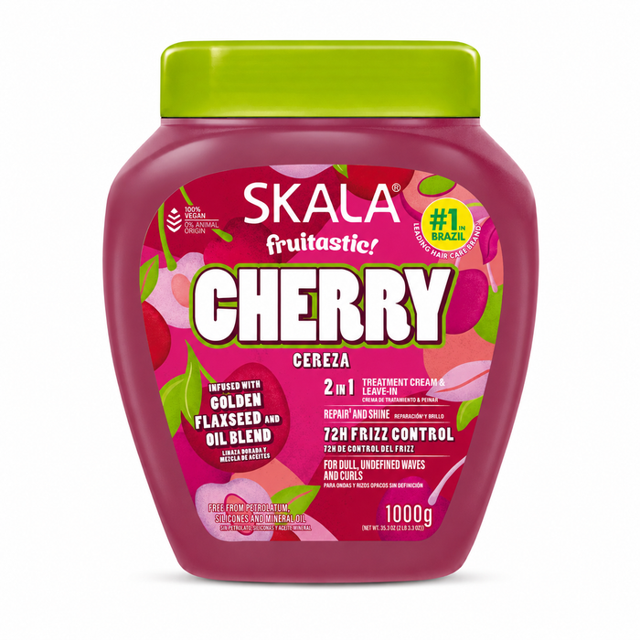Skala Fruitastic Cherry Hair Treatment Cream 1KG in a pink tub with a green lid, displayed on a clean white background. Vegan 2-in-1 treatment cream and leave-in infused with golden flaxseed and an oil blend to help repair hair, boost shine and provide up to 72 hours of frizz control for waves and curls.