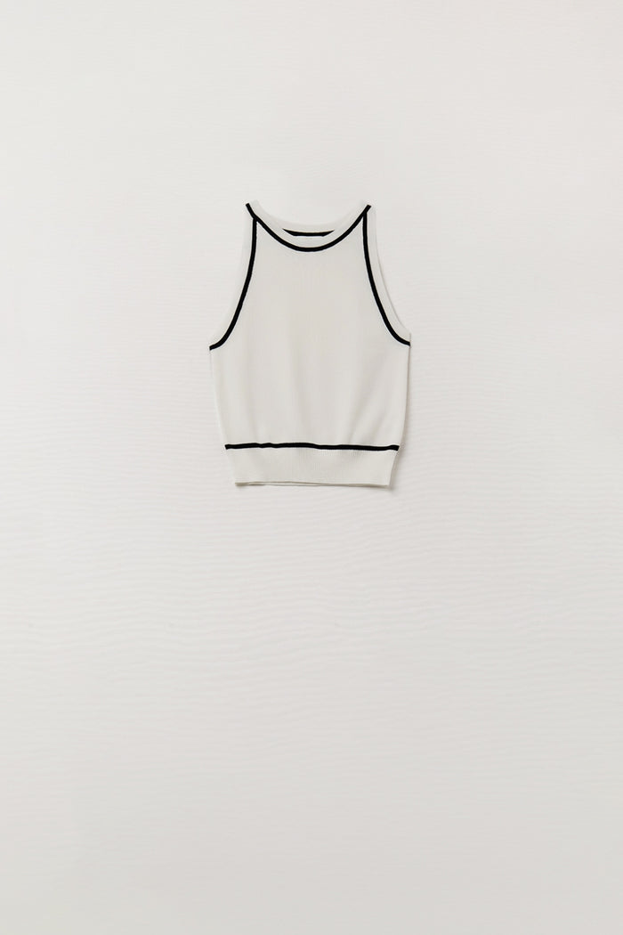 Sleeveless Sweater In White Featuring Black Lines On The Outside