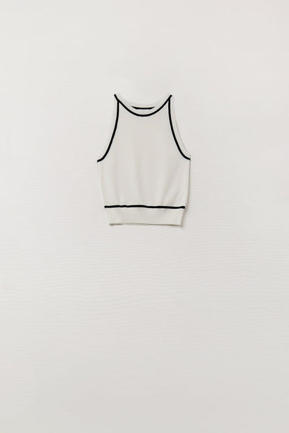 Sleeveless Sweater In White Featuring Black Lines On The Outside