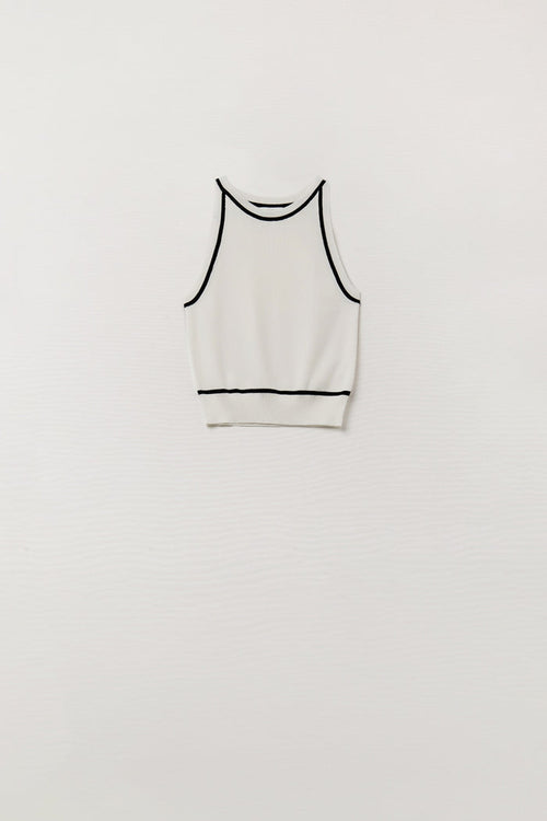 Sleeveless Sweater In White Featuring Black Lines On The Outside