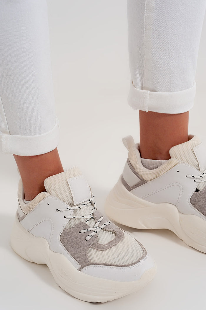 Slim jeans with asymmetric button in cream - Coloured Jeans