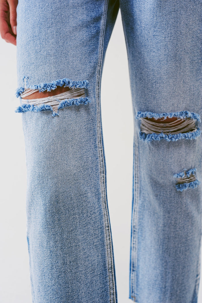 Sraight-leg jeans with exposed buttons and ripped knees in light wash - Denim