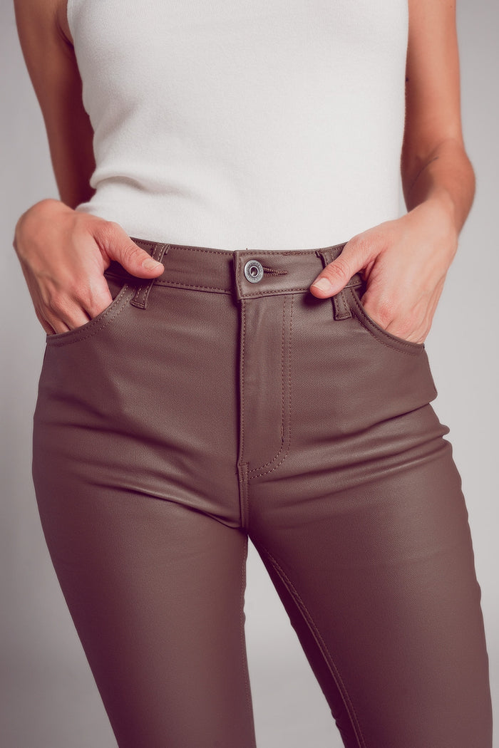 Stretch faux leather flare pants in beige - trousers