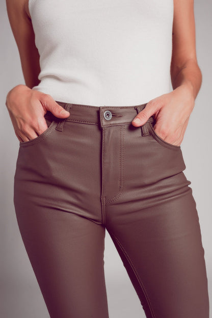 Stretch faux leather flare pants in beige - trousers