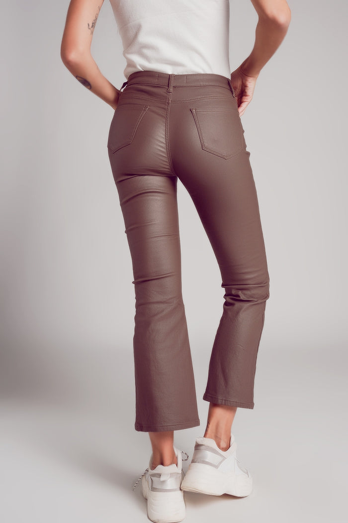 Stretch faux leather flare pants in beige - trousers
