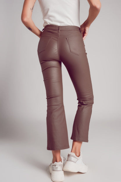 Stretch faux leather flare pants in beige - trousers