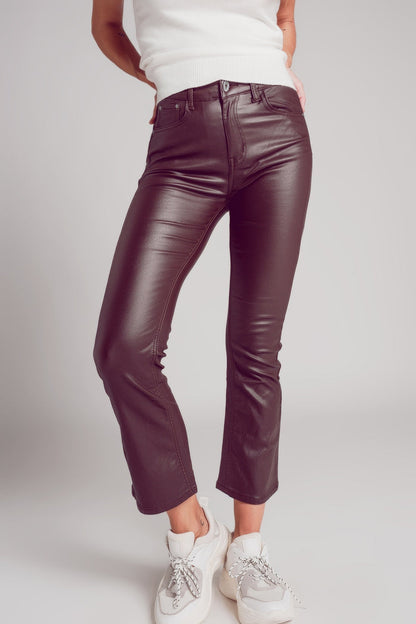 Stretch faux leather flare pants in brown - trousers