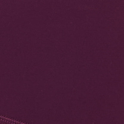 Fabric swatch for the LSPACE Stride Bra in plum, showing the plum color and fabric texture.