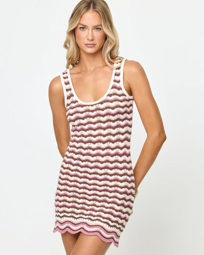Front view of a model wearing the LSPACE Sunchaser Dress in neapolitan, a crochet tank mini dress with a wavy stripe pattern in pink, chocolate, and cream.