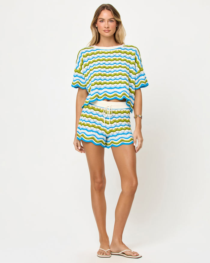 LSPACE Sunchaser top and short in Island Breeze, front view on model.