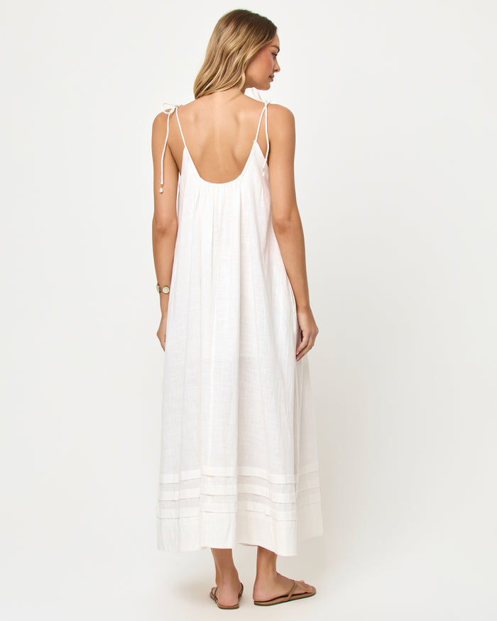 LSPACE Sunset Stroll Maxi in cream, back view on model showing open back.