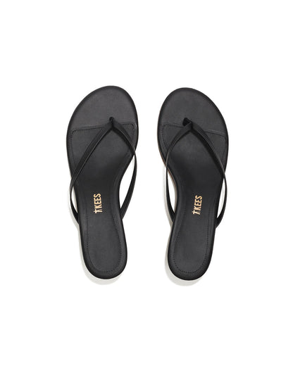 Top-down view of both black sable leather TKEES Julia Kitten Heel thong sandals.