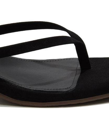 Close-up of the black suede thong strap and square-toe footbed on the TKEES Square Toe Julia Suede.