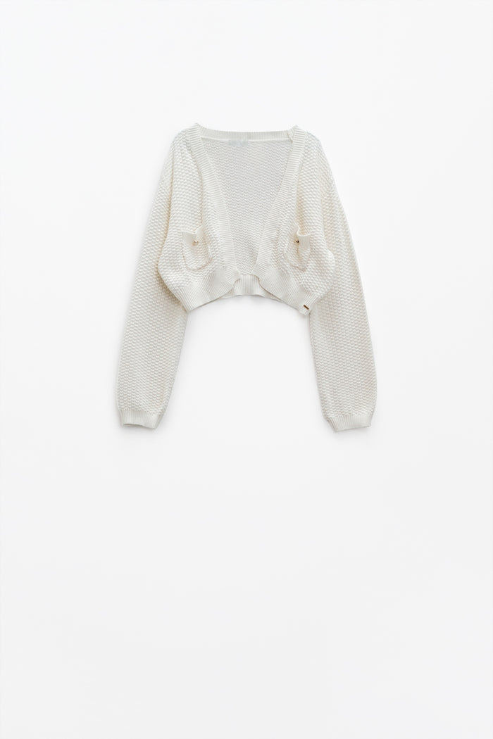 White long sleeve cardigan with button closure and front pockets