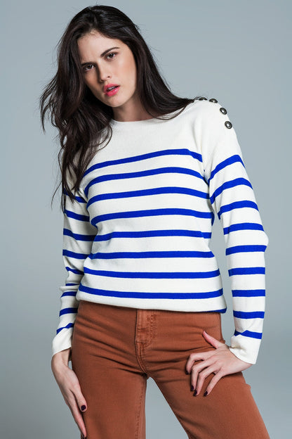 White sweater with buttons on shoulders and blue stripes