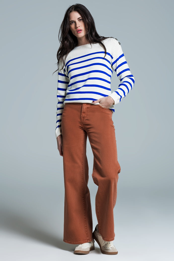 White sweater with buttons on shoulders and blue stripes