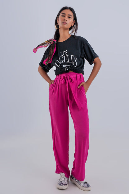 Wide leg belted pants in fuchsia - trousers