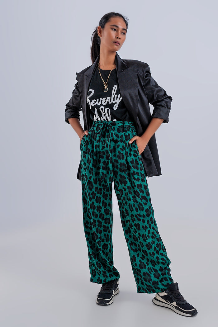 Wide leg pants in green leopard print - trousers