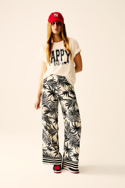 Wide Leg Pants In White With Floral Detail In Black - trousers