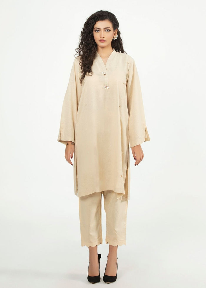Cream long tunic shirt with V-neck button front and loose long sleeves