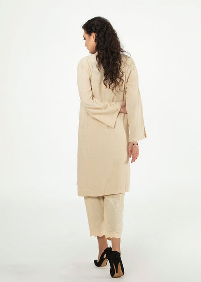 Cream long-sleeve tunic shirt with hood and buttoned back yoke