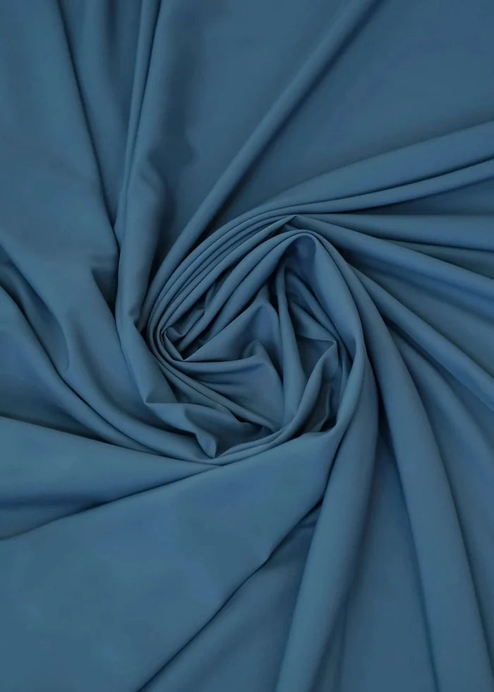 Cornet blue wash-and-wear fabric in gathered folds