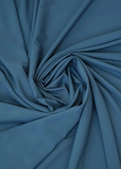 Cornet blue wash-and-wear fabric in gathered folds