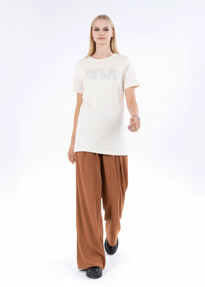 Off-white short-sleeve crewneck top with front logo graphic and straight hem