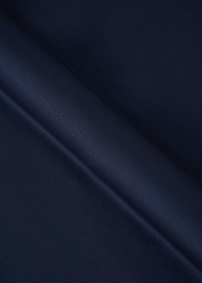 Deep navy dobby fabric with fine woven pattern, close-up texture