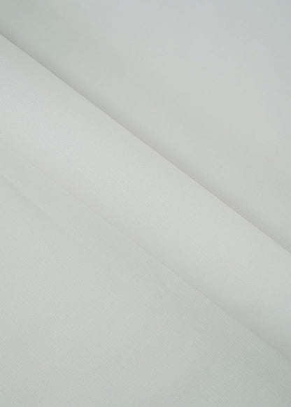 Off-white dobby fabric panel with subtle geometric weave, draped diagonally