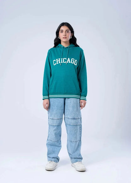 Women's teal terry pullover hoodie with CHICAGO front graphic and striped cuffs