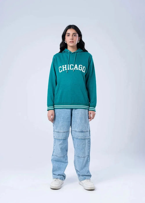 Women's teal terry pullover hoodie with CHICAGO front graphic and striped cuffs