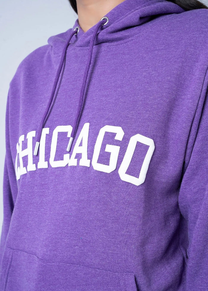 Purple pullover hoodie close-up with Chicago text graphic on back