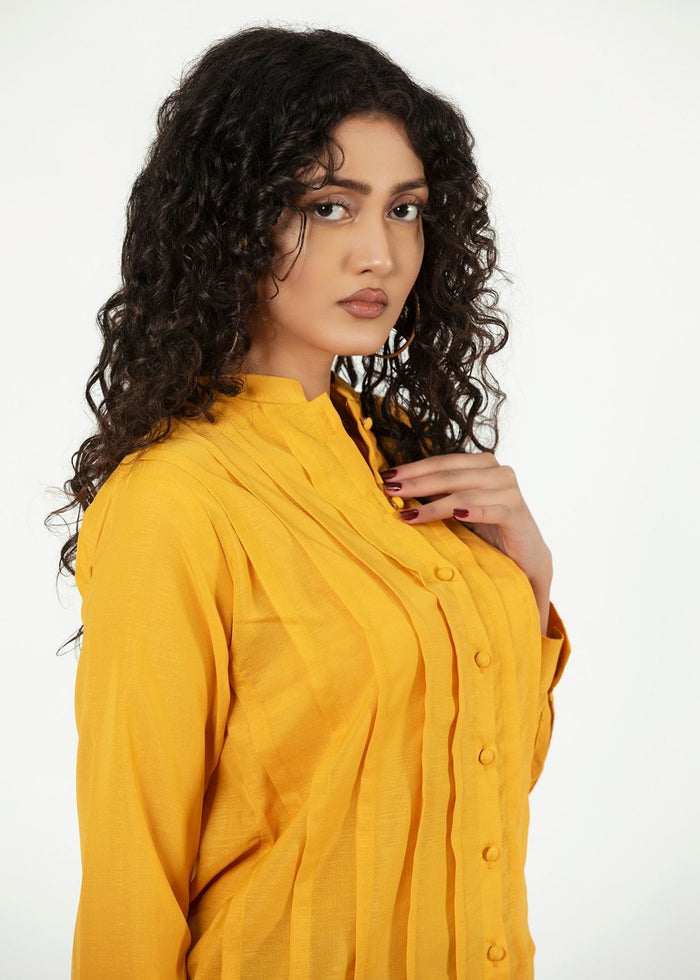 Women's mustard button-up winter shirt with stand collar and button placket detail